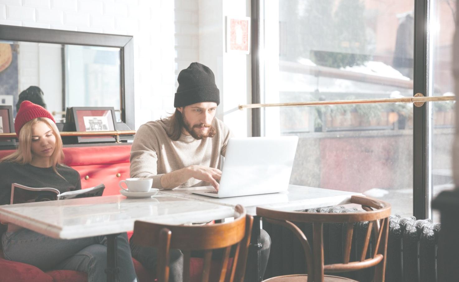 Students reviewing budget spreadsheets during workshop